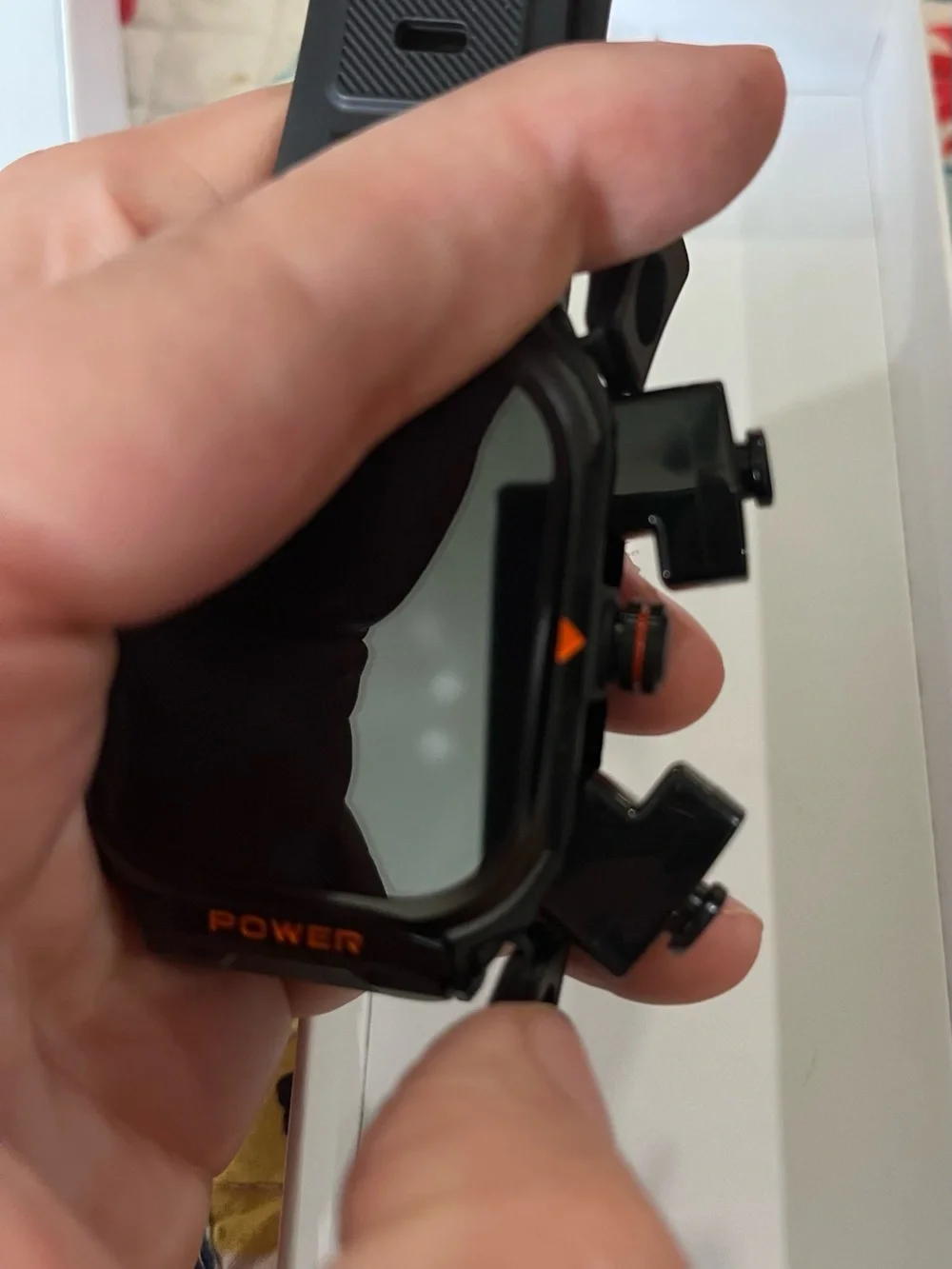Sport Rugged Smartwatch and earbuds in Black with Orange Accents